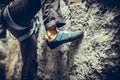 Person climbing while wearing rock climbing shoes Royalty Free Stock Photo