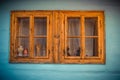 Close up shot of old wooden hut window.Vlkolinec,traditional settlement village in the mountains. Royalty Free Stock Photo