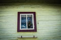 Close up shot of old wooden hut window.Vlkolinec,traditional settlement village in the mountains. Royalty Free Stock Photo