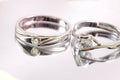 Close up shot of pair engagement /  mariage rings isolated Royalty Free Stock Photo