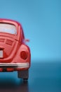 Close up shot of a Partial Backside of a red colored toy model car