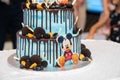 Close-up shot of a party cake with Mickey Mouse theme