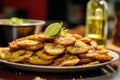 Close up shot of patacones or fried green bananas. Traditional Latin American snack