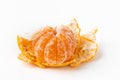 Close up shot of peeled tangerine isolated on the white background. Juicy orange mandarine slices on the peel Royalty Free Stock Photo