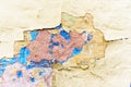 Close-up shot of peeling damaged plaster wall Royalty Free Stock Photo