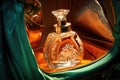 close-up shot of a perfume bottle inside an open handbag