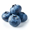 A close-up shot of a pile of blueberries stacked on top of each other, showcasing the vibrant colors and textures of the Royalty Free Stock Photo