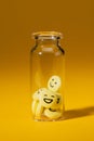 close-up shot of pills with smiley faces in glass bottle Royalty Free Stock Photo