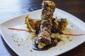 Close up shot of a plate of Cannoli