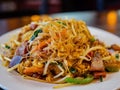 Close up shot of a plate of delicious Singapore curry noodles