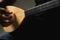 Close up shot of Playing Kopuz which is a string instrument Royalty Free Stock Photo