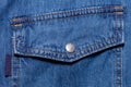 Close up shot of pocket of blue denim jeans shirt. Clothing store and shopping concepts Royalty Free Stock Photo