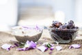 Close up shot of popular Indian & Asian winter dessert in a transparent glass bowl i.e. Khajor ka halwa or dates confection with r