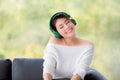 Close up shot portrait of young beautiful Asian woman sitting on Royalty Free Stock Photo