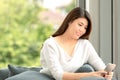 Close up shot portrait of young beautiful Asian woman sitting on Royalty Free Stock Photo