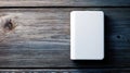 White rectangular object on aged wooden background Royalty Free Stock Photo
