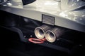 Rear exhaust pipe of a sports car Royalty Free Stock Photo