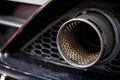 Rear exhaust pipe of a sports car Royalty Free Stock Photo