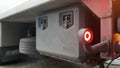 Close-up shot of the rear round red marker light of a truck. Rear light for a truck. The background is blurred. The concept of Royalty Free Stock Photo