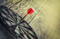 Close up shot red dart arrow on center of dartboard. Royalty Free Stock Photo