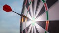 Close up shot red dart arrow on center of dartboard, metaphor to target success, winner concept. 3D illustration