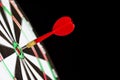 Close up shot red darts arrows in the target center Royalty Free Stock Photo