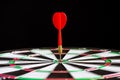 Close up shot red darts arrows in the target center Royalty Free Stock Photo