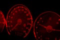 Close up shot of red speedometer in a car. Car dashboard. Dashboard details with indication lamps.Car instrument panel. Dashboard Royalty Free Stock Photo