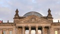 Close up of the reichstag pediment and dome in berlin, germany