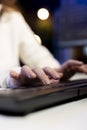 Close up shot of remote IT worker testing and debugging code