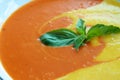 Vibrantly colored carrot and parsnip soup.