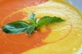 Vibrantly colored carrot and parsnip soup.
