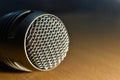 Close up shot of retro microphone on wooden desk Royalty Free Stock Photo