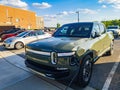 Close up shot of a Rivian electric truck charging