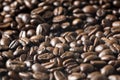 Close up shot of Roasted coffee Beans fore and background out of focus