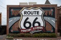 Close-up shot of the Route 66 mural on an old exposed brick building
