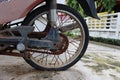 Close-up Shot Of A Rusty And Old Motorcycle Rear Wheel With A Flat Tire