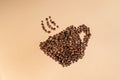 Close-up shot of scoop and roasted coffee beans spilled Royalty Free Stock Photo