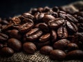 Coffee beans roasted with burlap sack background Close-up Royalty Free Stock Photo