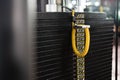 Close up shot with selective focus at iron plate scale of weight lifting machine. Sport and exercise equipment for bodybuilding or Royalty Free Stock Photo