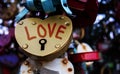 Close up shot in the shape of a love castle heart, locked on a railing bridge. Moscow