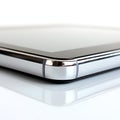 Sleek Silver Tablet Corner Royalty Free Stock Photo