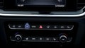 Closeup of modern car interior dashboard with climate control panel and digital display Royalty Free Stock Photo