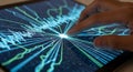 Finger interacting with futuristic digital data visualization on a tablet Royalty Free Stock Photo