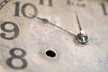 Close up of an old clock face at 10