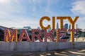 Close up shot of the sign of City Market