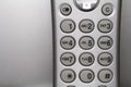 Close up shot of a silver cordless phone