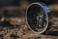 Close up shot of a silver metal compass always pointing it's needle towards North Royalty Free Stock Photo