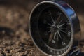 Close up shot of a silver metal compass always pointing it's needle towards North Royalty Free Stock Photo