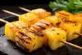 close-up shot of skewers showing texture of pineapple chunks